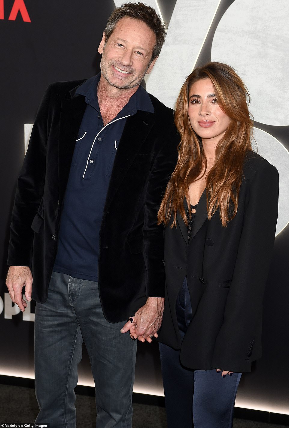 Hand in hand: David, star of the hit series Californication, attended the premiere on the arm of his girlfriend Monique Pendleberry, who at 29 is 32 years his junior