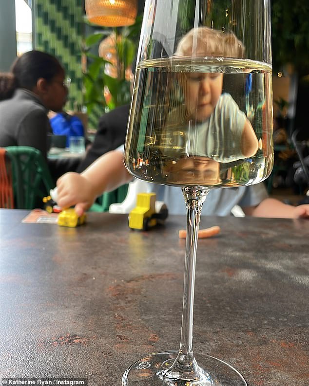 Distortion: Katherine took a photo of her son through a glass of white wine in a restaurant for a fun photo