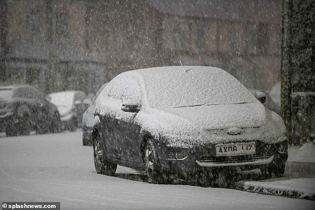 Temperatures dropped as low as -5C and -6C overnight, with some places waking up to heavy snowfall today. Pictured: Stoke-on-Trent