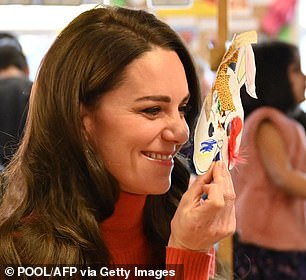 Princess of Wales plays with children