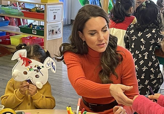 Cuckoo!  As the princess started crafting with one of the kids at the daycare, a cheeky boy put the bunny mask on her face.