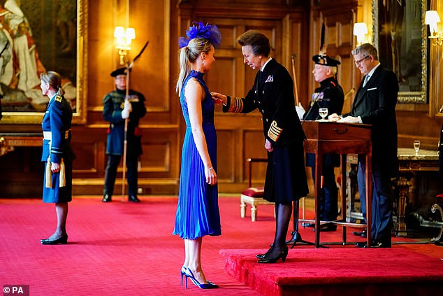 Drummond wore a striking blue dress, with matching hat and heels to attend the awards ceremony