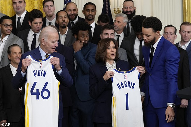 The reigning NBA champion, the Golden State Warriors basketball team, presented the president and vice president with jerseys.  Biden's was number 46, since she is the 46th president, and Harris was number 1, probably because she is the first woman and minority vice president in US history.