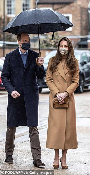 Kate has worn the stylish coat on a number of occasions in the past, including to visit paramedics in East London in 2021 (left) and