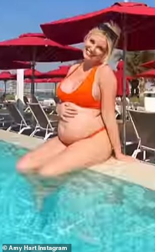 'Bye Bye Second Trimester': It comes after the Love Island star shared a series of photos of her bump on Instagram earlier this month as she detailed the 'excruciating pain' and cravings she's enduring.