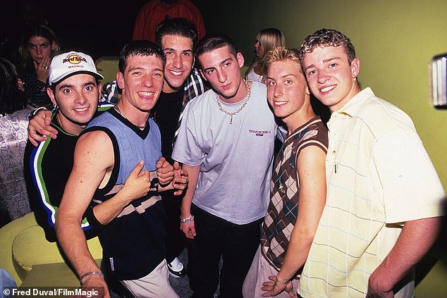 Pressure to conform: The 43-year-old Frosted Tips host (2-R, pictured in 1997) knows a thing or two about being in the closet and has only hooked up with women until he was 22 during his boyband heyday *NSYNC