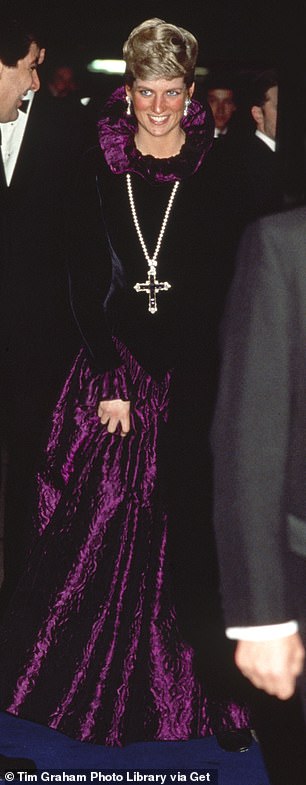 The Princess of Wales wore the sparkling piece of jewelry during a charity gala in London in October 1987. She paired the luxurious necklace with a long-sleeved burgundy and black velvet gown, which came with a ruffled neckline.