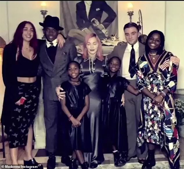 2020 Family Portrait: Madonna is also the mother of her daughter Lourdes, 26 (with Carlos León);  her son Rocco, 22 (with her ex-husband #2 Guy Ritchie);  son David Banda, 17;  twin daughters Estere + Stella, 10;  and 'much of my happiness comes from them'