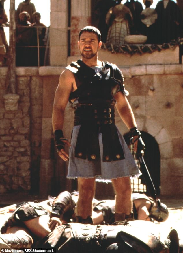 Popular Movie: Russell Crowe is shown in a still from the 2000 movie Gladiator which was also inspired by the book Those About to Die.