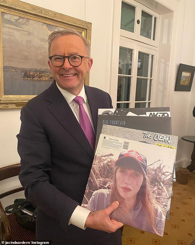 Anthony Albanese shows off his new record crop following a trade with Jacinda Ardern