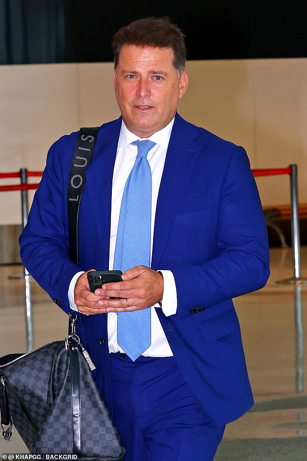 Dressed in a navy blue suit and light blue tie, Stefanovic refused to utter a word, but seemed visibly amused by the photographer's line of questioning.