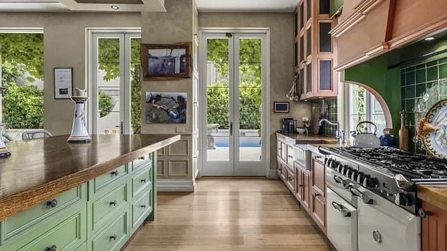 The amazing kitchen with natural wood and cabinets.