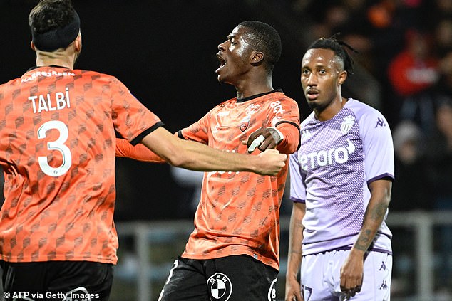 The 20-year-old (centre) has impressed this season with six goals in 18 Ligue 1 appearances