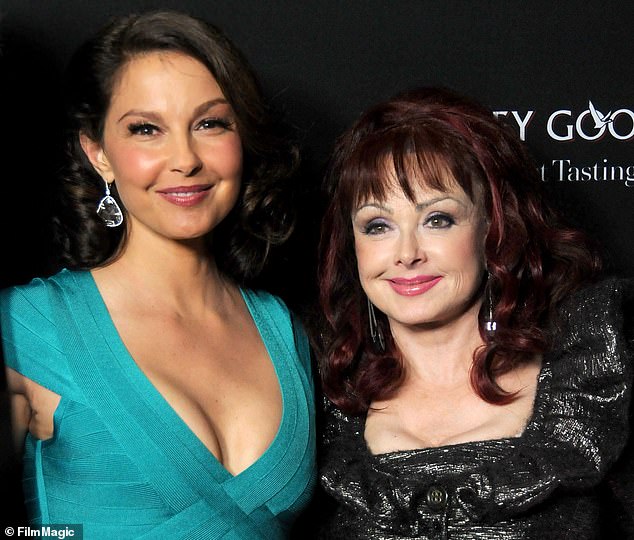 Ashley Judd (left) with her mother Naomi Judd (right).  Ashley and her family filed a petition to seal police records of interviews taken in the moments after Naomi's suicide last April.  The family abandoned their efforts in December.