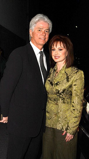 Larry Strickland pictured with Naomi Judd