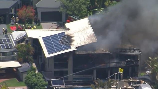 It took hours for firefighters to bring the blaze (pictured) under control, which is believed to have been started by a battery being charged in the garage.