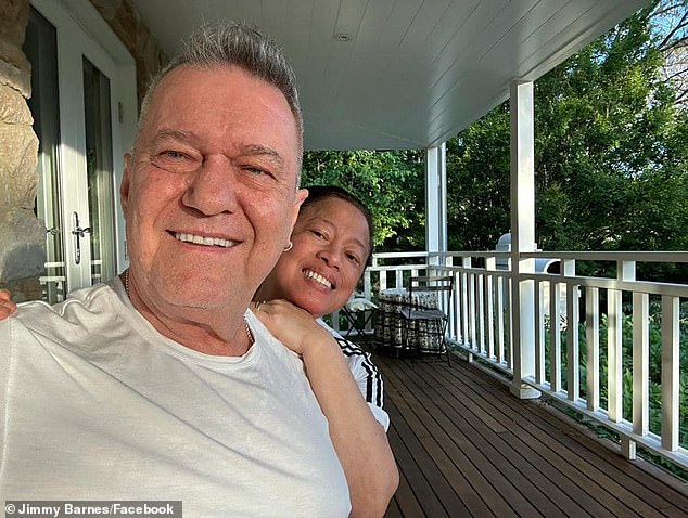 Jimmy canceled his summer tour so he could have urgent surgery to relieve chronic pain that had troubled him for some time.  Jimmy shows up at his house with his wife, Jane.