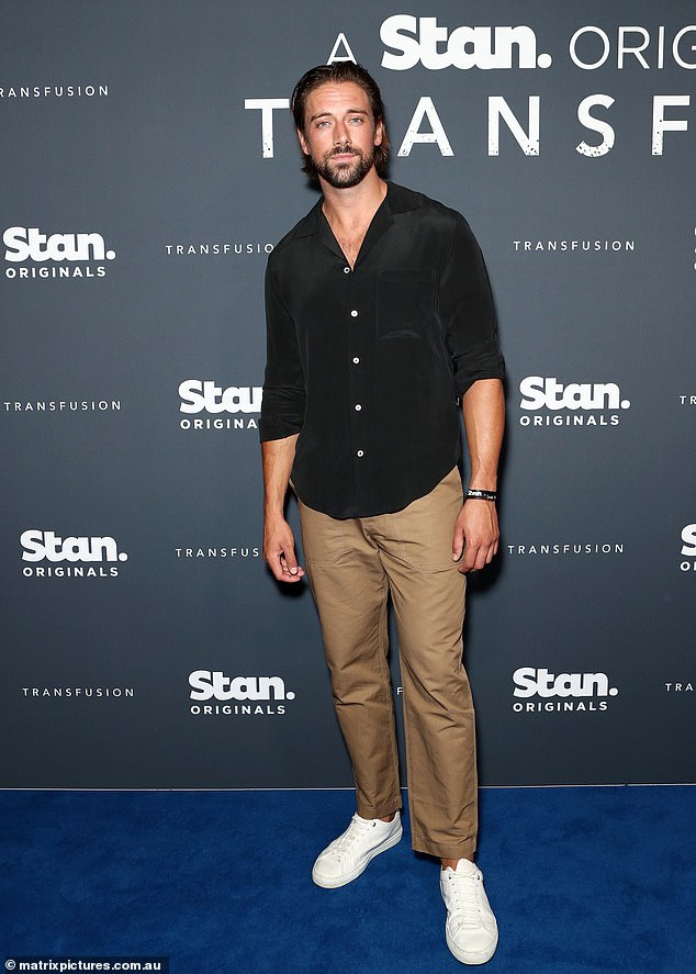 Lincoln Younes looked dapper in a black button-down shirt that he teamed with beige pants and white sneakers.