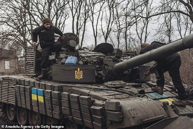 Ukrainian tankers perform maintenance on their tanks on the Donbass front as military mobility within the Russo-Ukrainian war continues on January 18, 2023.