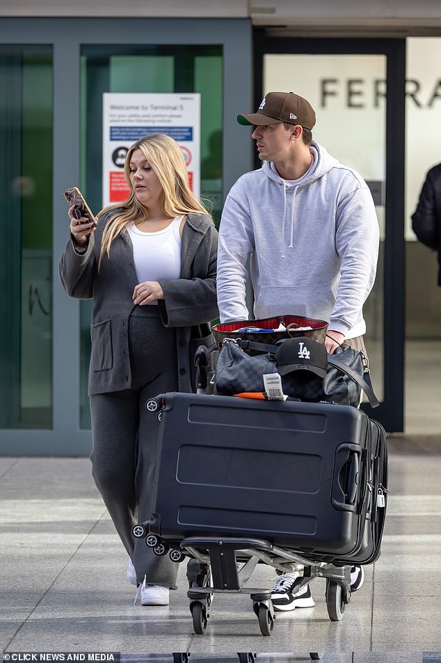 Landing: Shaughna, who hasn't revealed the identity of her boyfriend until now, showed off her growing bulge in a comfy pair of charcoal joggers with a white T-shirt