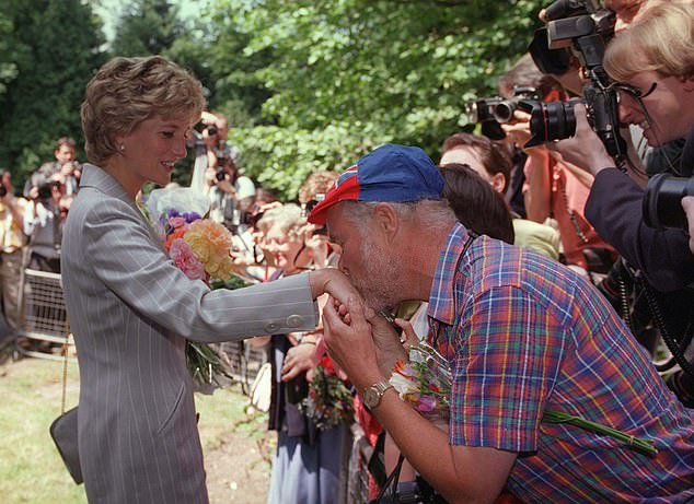 Princess Diana first visited the charity in 1990 (pictured on one of her many visits) where she worked with the homeless.