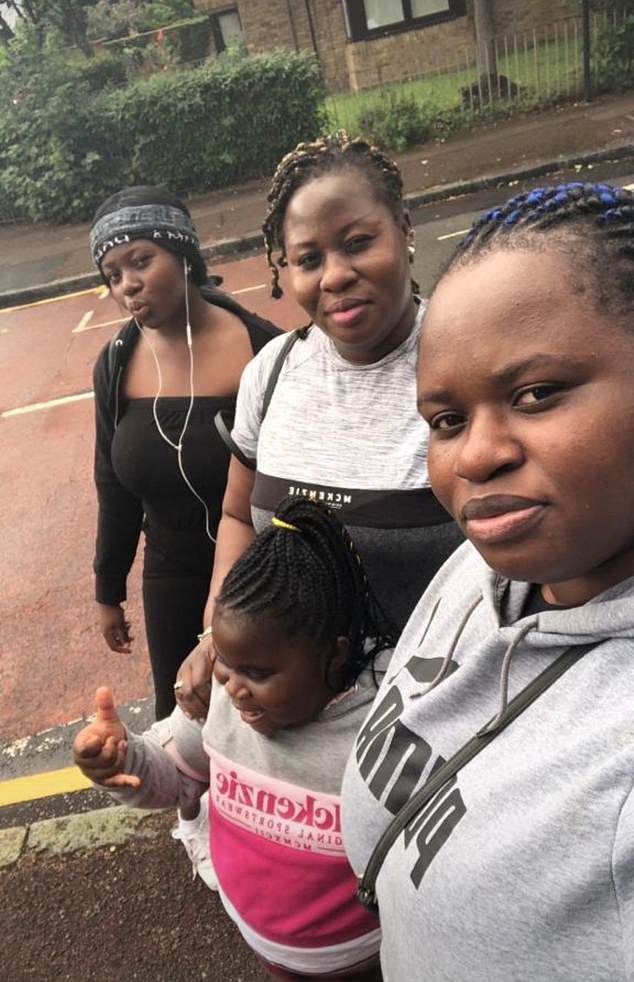 Their daughter Emmanuela (right), 18, said her mother came home with the flu on Sunday 8 January and quickly declined (pictured right: Emmanuela, Emily, 9, her mother Maame and her half sister Priscilla)