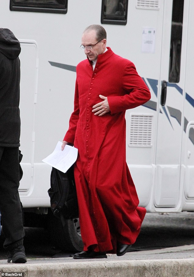 Filming: The actor was later seen dressed in his costume for the show, which consists of a bright red tunic with a high collar.