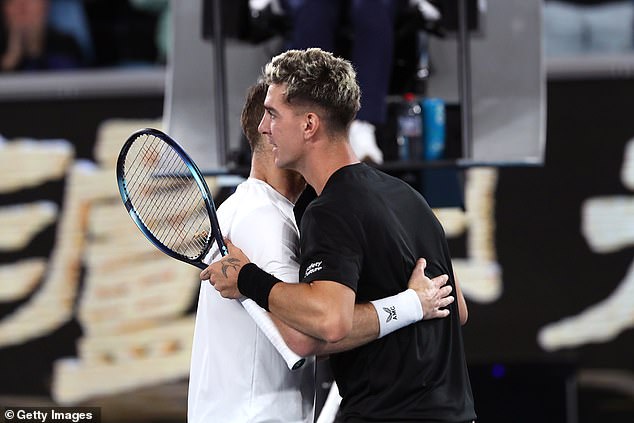 They put their differences aside in the match when the two heartbroken men embraced at the end of the epic.