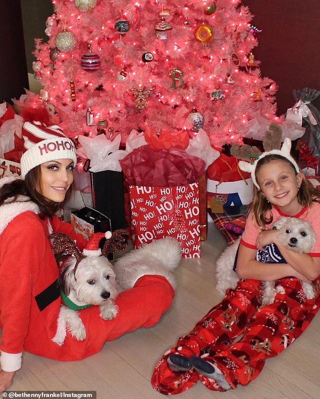 Good Mommy: Frankel seen with his daughter and dogs during Christmas