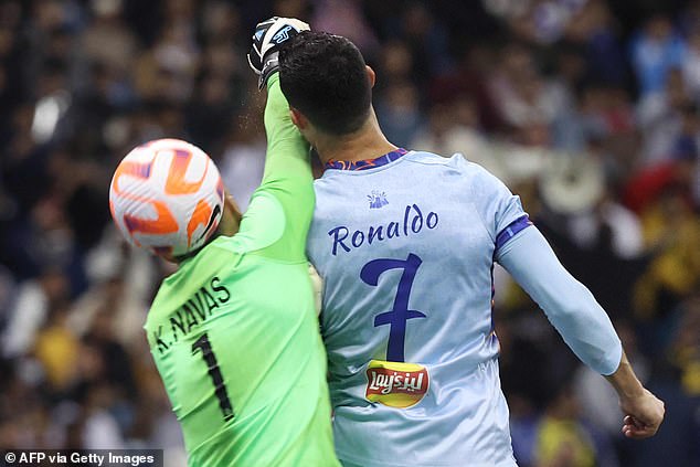 PSG goalkeeper Keylor Navas received a yellow card for the challenge (pictured above)