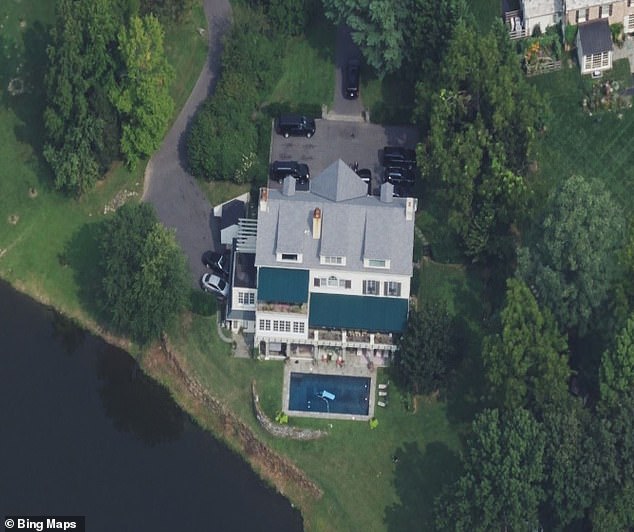 Biden is under pressure for having classified documents in his Delaware home.  An aerial view of the lakefront mansion is shown.