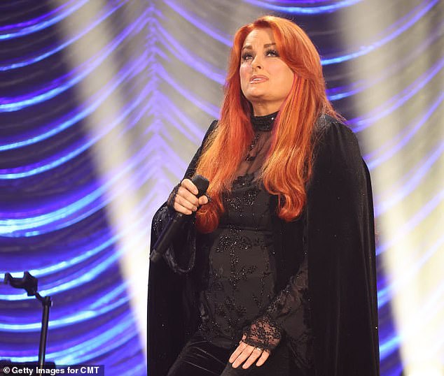 Wynonna Judd sings in May following the death of her mother Naomi