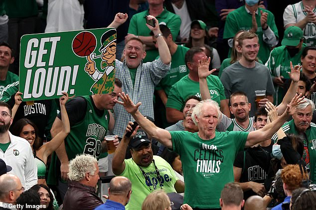 Former Boston Celtics player Bill Walton cheers with fans in the third quarter during Game 3 of the 2022 NBA Finals against the Golden State Warriors.