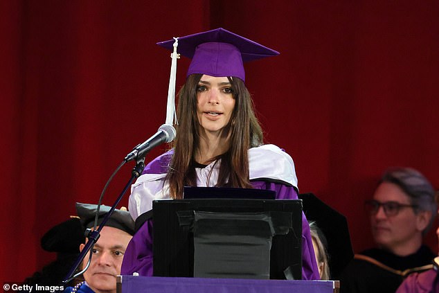 Taking the stage: Emily, who briefly attended UCLA before dropping out, donned a purple cap and gown as she addressed the winter graduates from the podium.