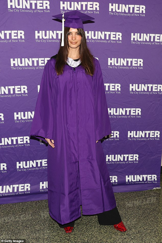 Strike a Pose: She smiled as she posed in her purple cap and gown