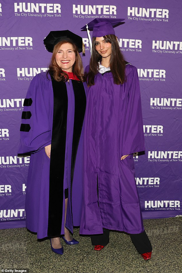 It is an honor!  He posed with Hunter College President Jennifer J. Raab.