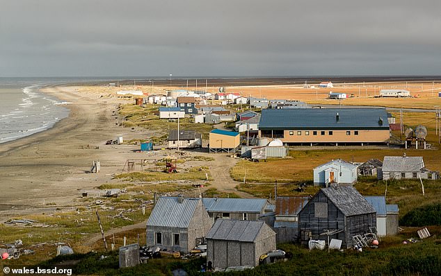 Kingikmiut School is only a few hundred meters from the shoreline of the Bering Strait, which freezes over in the winter months.  The school is shown here in the summer.