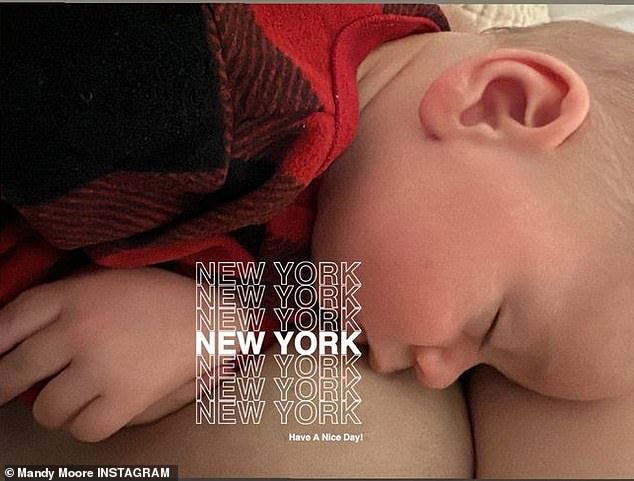 Sweet and funny: Mandy also shared a photo of her three-month-old son, Oscar 'Ozzie' Bennett, asleep on her chest after nursing  'He "between shots" pillow mama,' the proud mama's witty caption read.