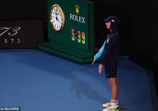 The clock strikes 4 am during the Murray vs. Kokkinakis match as a ball boy patiently takes his place, ready for the next serve.