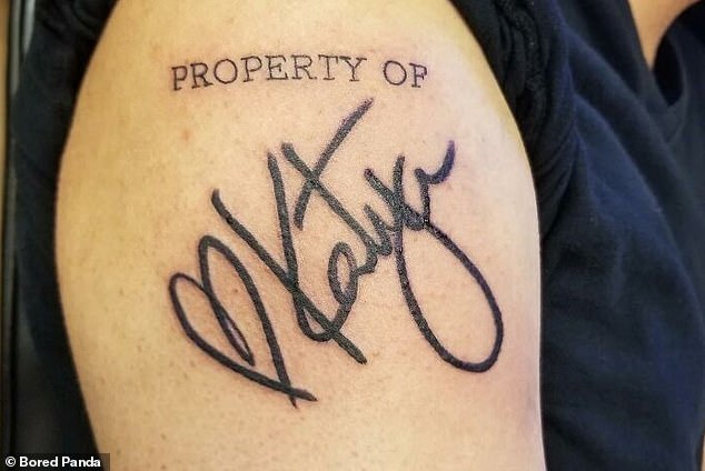 Possessive limit!  Katya in the US has decided to make a horrible display of power over her boyfriend by tattooing her name in large letters on her upper arm.