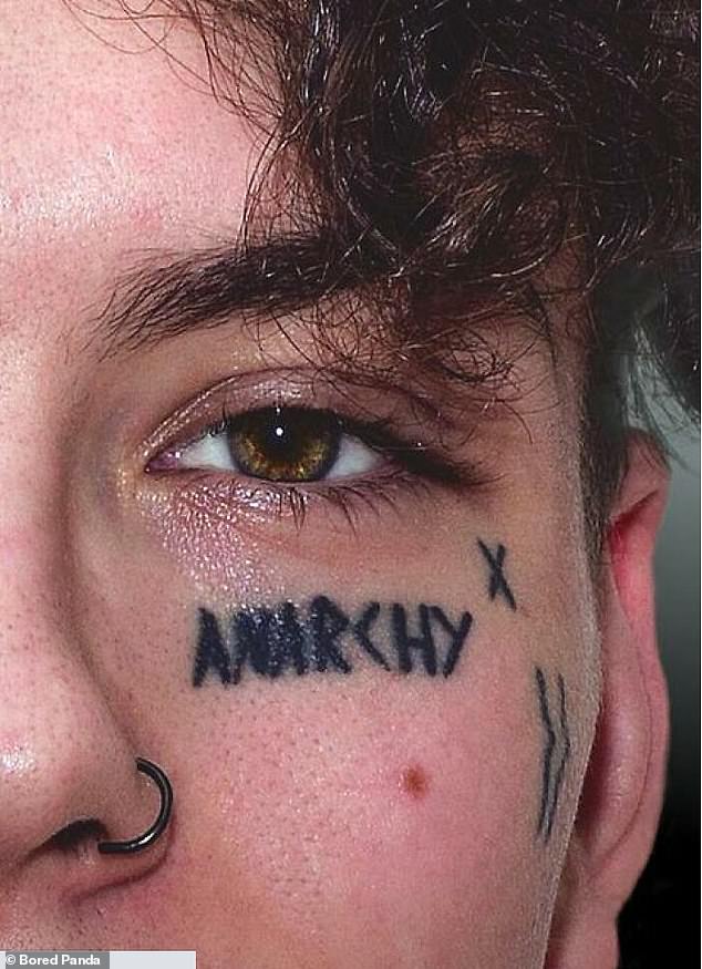 I can not hide it!  In an unknown place, this guy has tattooed 'anarchy' on his face... We hope you like it, as it won't be easy to hide.