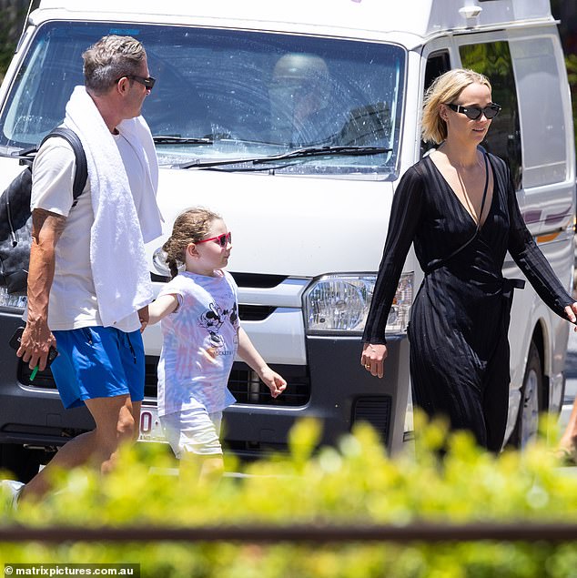 Sources said Michael Clarke (above with daughter Kelsey and Jade Yarbrough) had taken the six-year-old from Noosa to be with her mother Kyly Boldy in Burleigh Heads, after things got tense with his girlfriend.