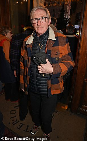 Mother of God, it's cold!  Adrian Dunbar from Line Of Duty bundled up in a checked coat