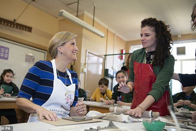 The royal mother-of-two wore a custom apron over her £1,200 designer dress by Gabriella Hearst