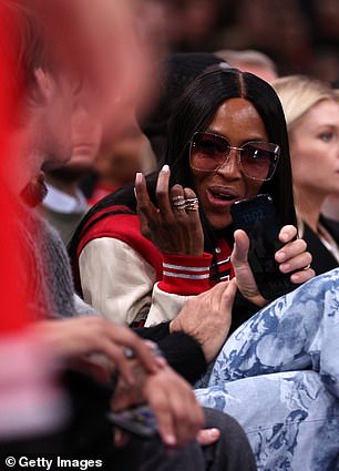 Glamour: Supermodel Naomi wore multiple gold rings to match the gold hardware on her oversized sunglasses