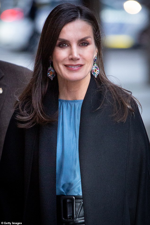 She was wearing a 70-pound (80-euro) blouse from the sustainable brand Pol Studio.  She completed her outfit with striking multicolored earrings.