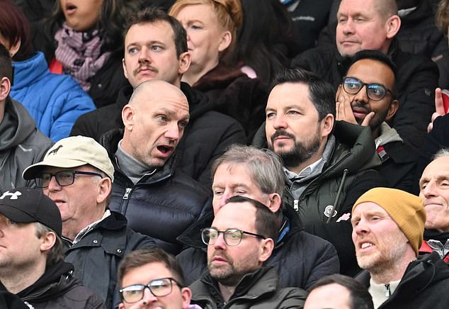 Reus representatives Dirk Hebel (R) and Darren Freeman (L) were seen at Old Trafford