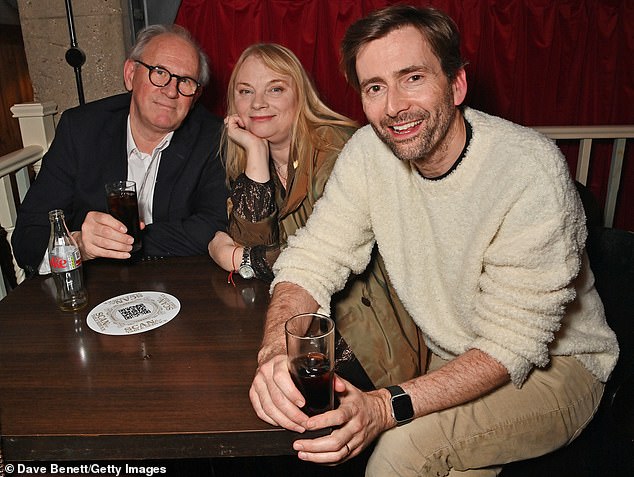 Friends: David, Capaldi and Peter Davison joined other stars in supporting the writer and producers.  Pictured: David, Davison's wife Elizabeth Morton and Davison