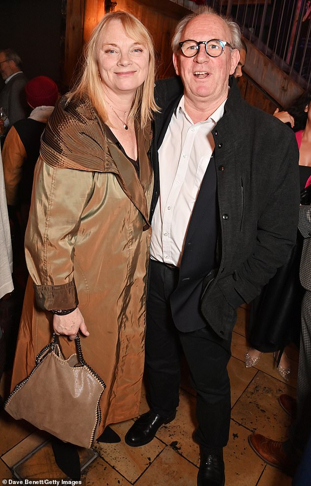 Love: Davison and his wife Elizabeth smiled together and enjoyed their evening in London