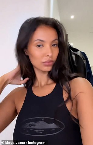 Model: Maya looked in the mirror as she got ready to film